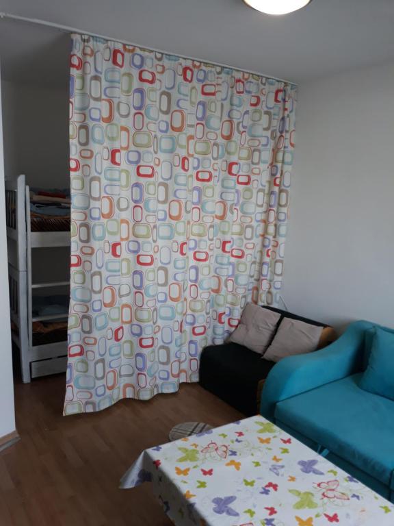 Un pat sau paturi într-o cameră la Kudebi