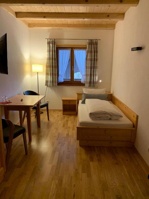 Postel nebo postele na pokoji v ubytování Zum Dammerbauer