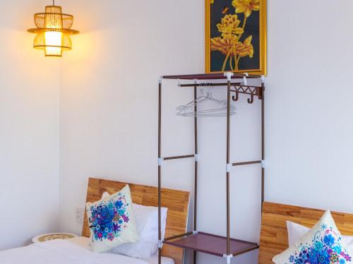 Postel nebo postele na pokoji v ubytování Star Garden Hoi An