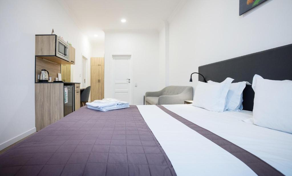 Postel nebo postele na pokoji v ubytování Partner Guest House Khreschatyk