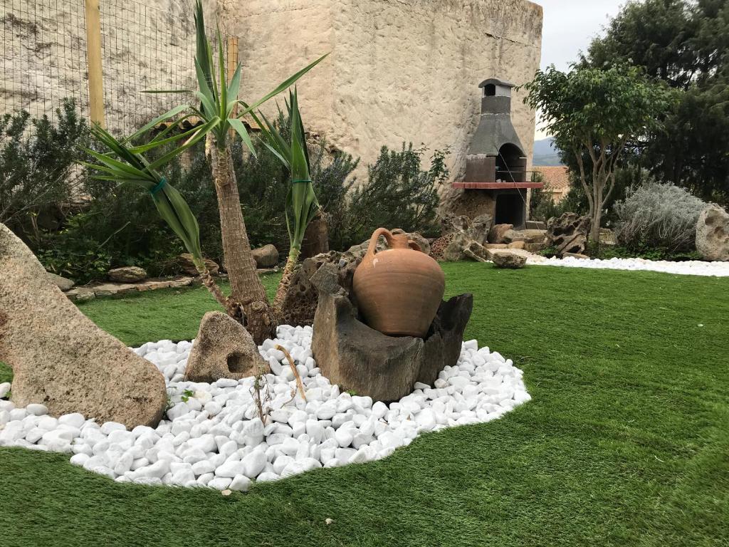 A garden outside Appartamenti Budoni
