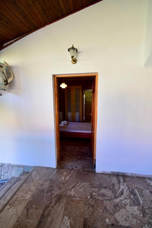 Fotografie z fotogalerie ubytování Menis Haus Rooms v destinaci Nea Vrasna