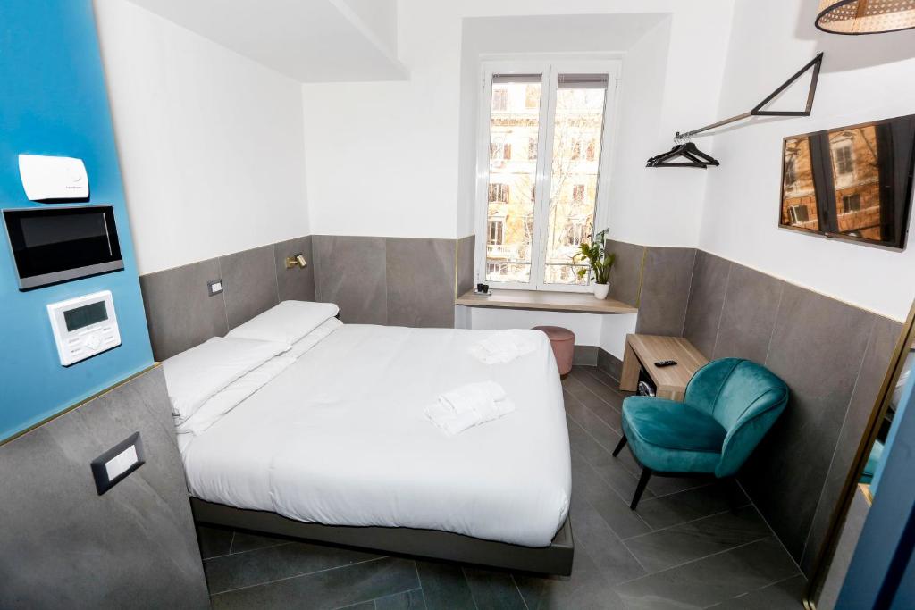 Posteľ alebo postele v izbe v ubytovaní Ottaviano Smart Rooms