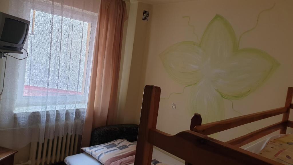 Postel nebo postele na pokoji v ubytování OKW Pilsko