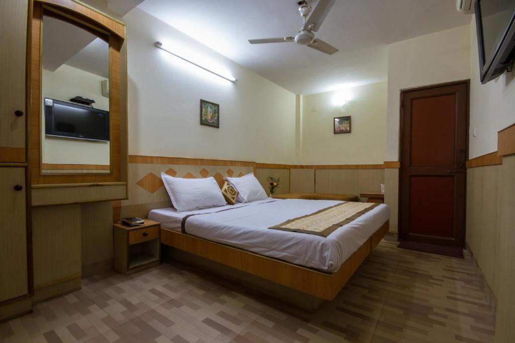 Postel nebo postele na pokoji v ubytování Hotel Kwality