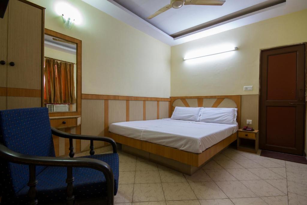 Postel nebo postele na pokoji v ubytování Hotel Kwality