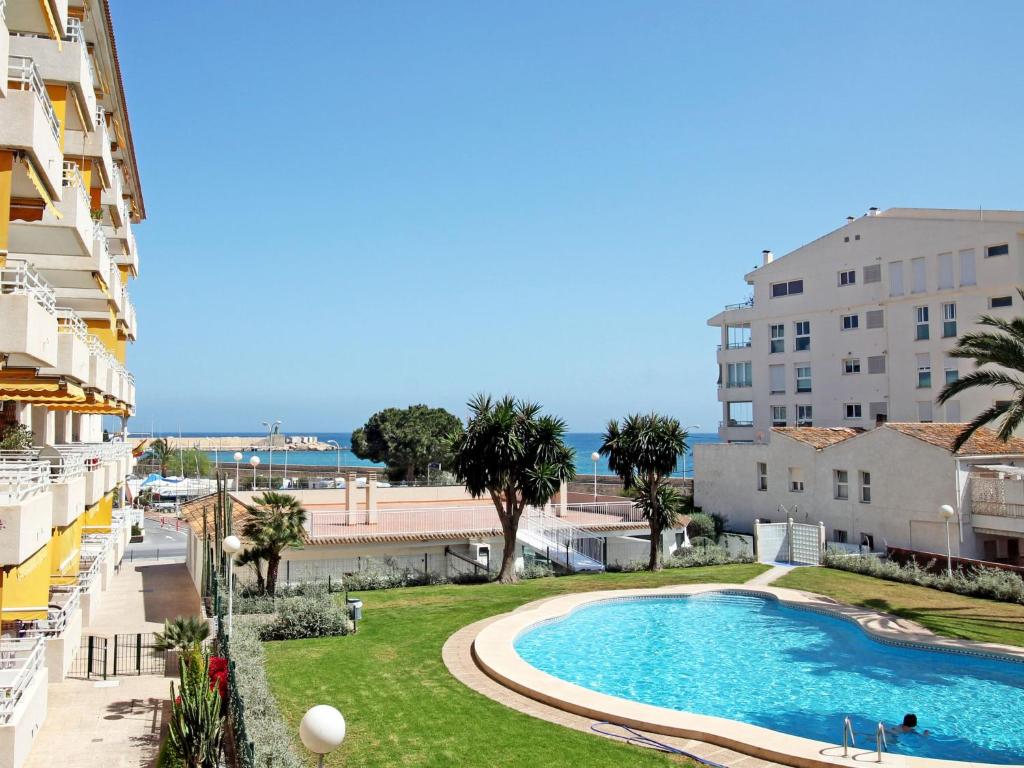 a view of the pool from the balcony of a building at Apartment Sol Y Mar by Interhome in Altea
