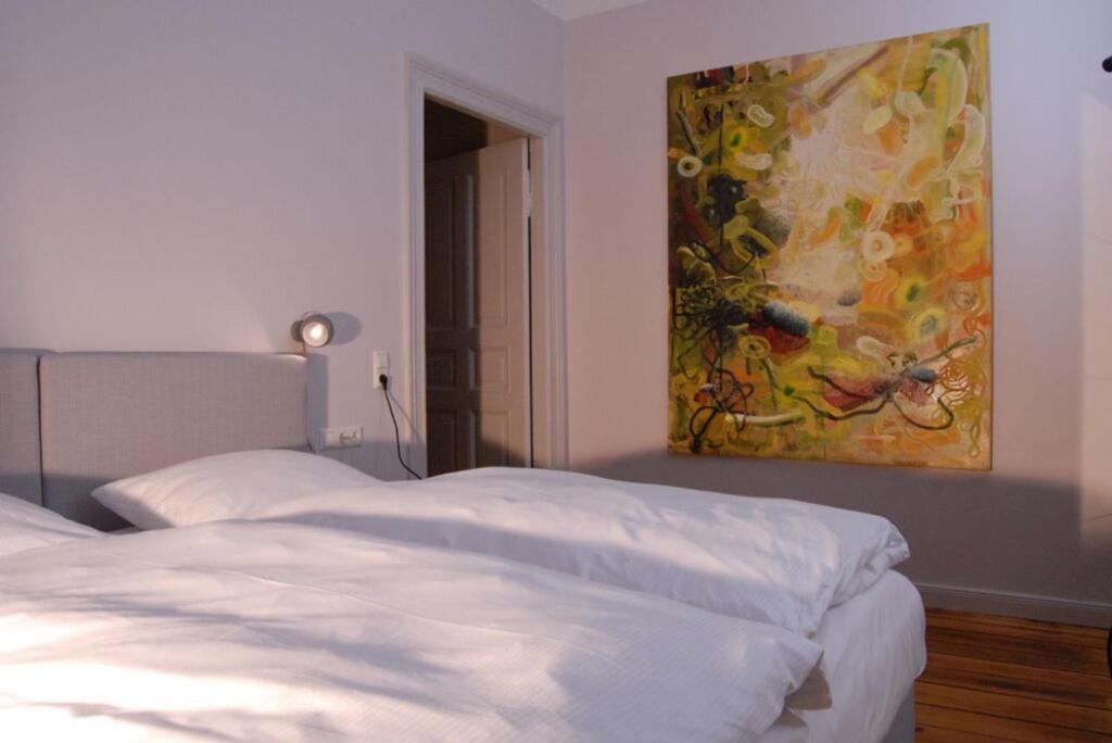 Postel nebo postele na pokoji v ubytování Wil7 Boutique Hotel