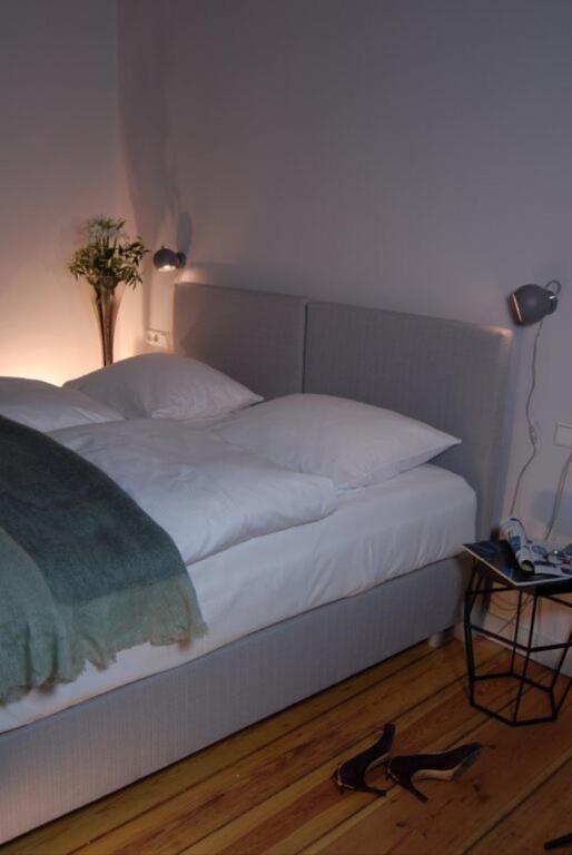 Postel nebo postele na pokoji v ubytování Wil7 Boutique Hotel