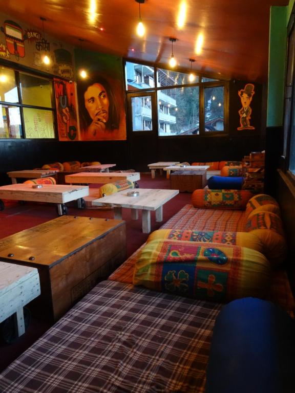 Letto o letti in una camera di La Vaca India Manali
