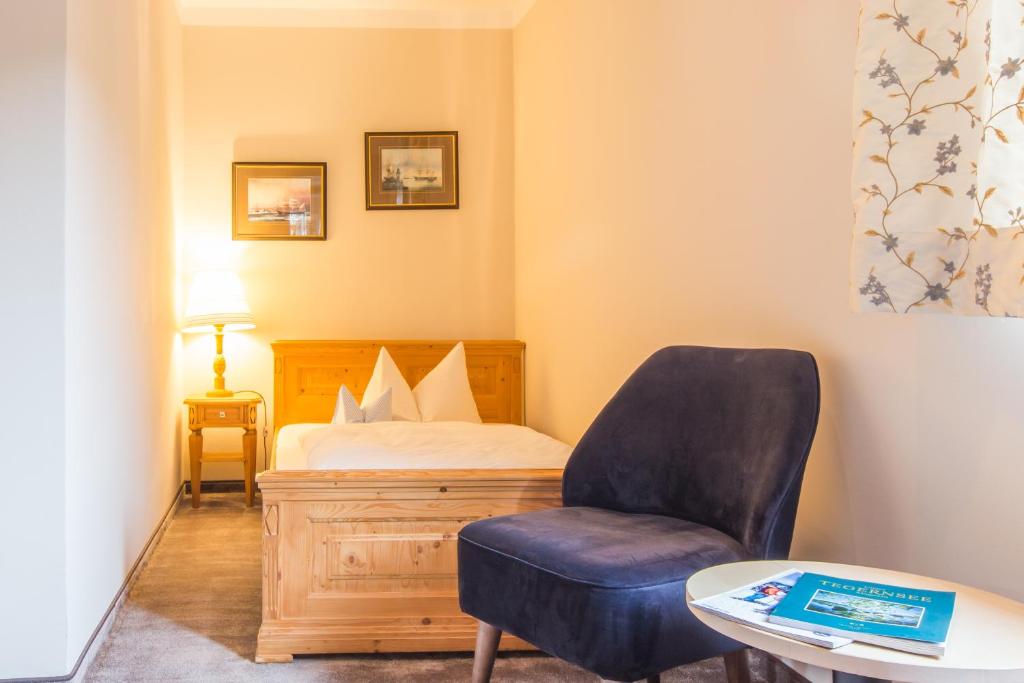 Postel nebo postele na pokoji v ubytování Hotel Berlin Tegernsee