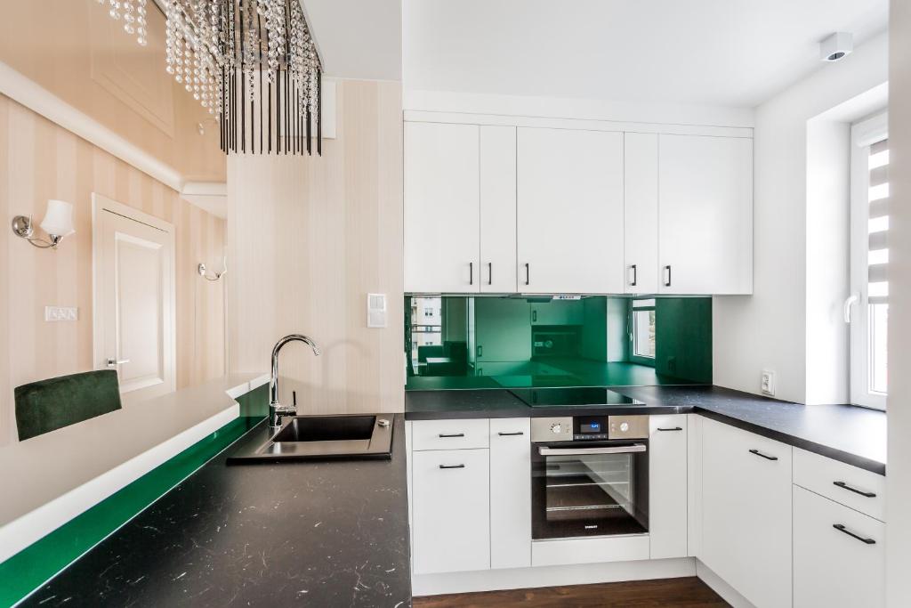 Kuchyňa alebo kuchynka v ubytovaní ResiNest Apartamenty Nowe Bojary