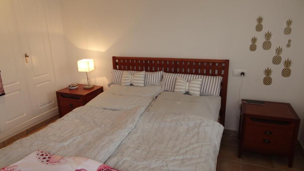 A bed or beds in a room at Estrella