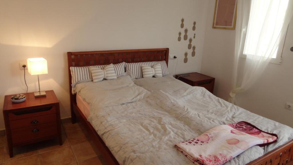 A bed or beds in a room at Estrella