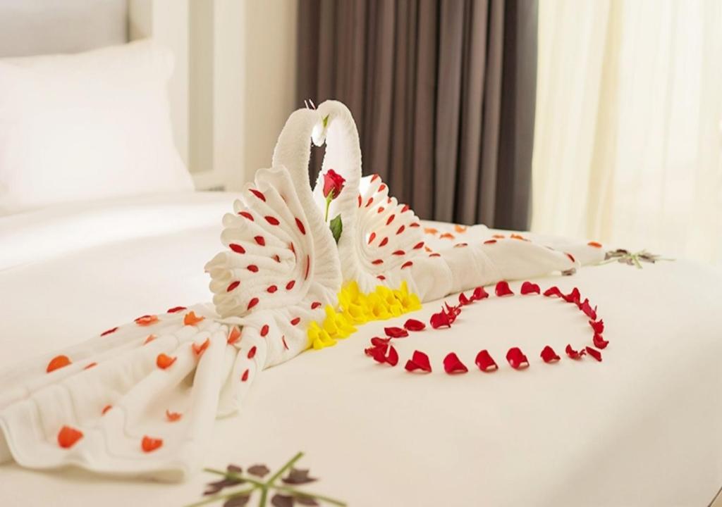 Postel nebo postele na pokoji v ubytování Camellia Boutique Hotel & Spa