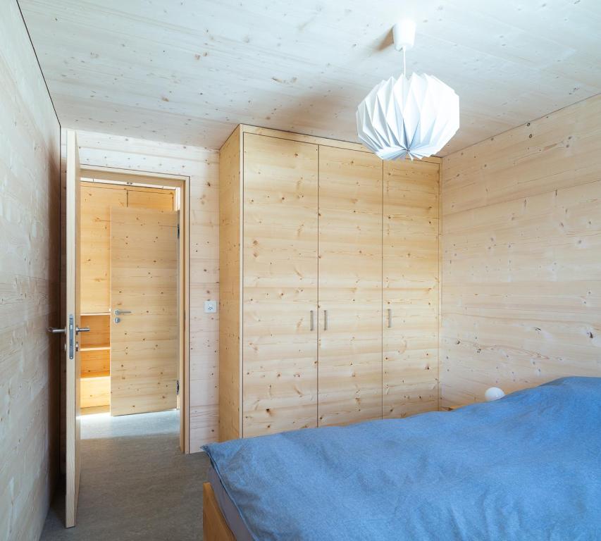 Postel nebo postele na pokoji v ubytování Labbrunnu OG in den Walliser Alpen