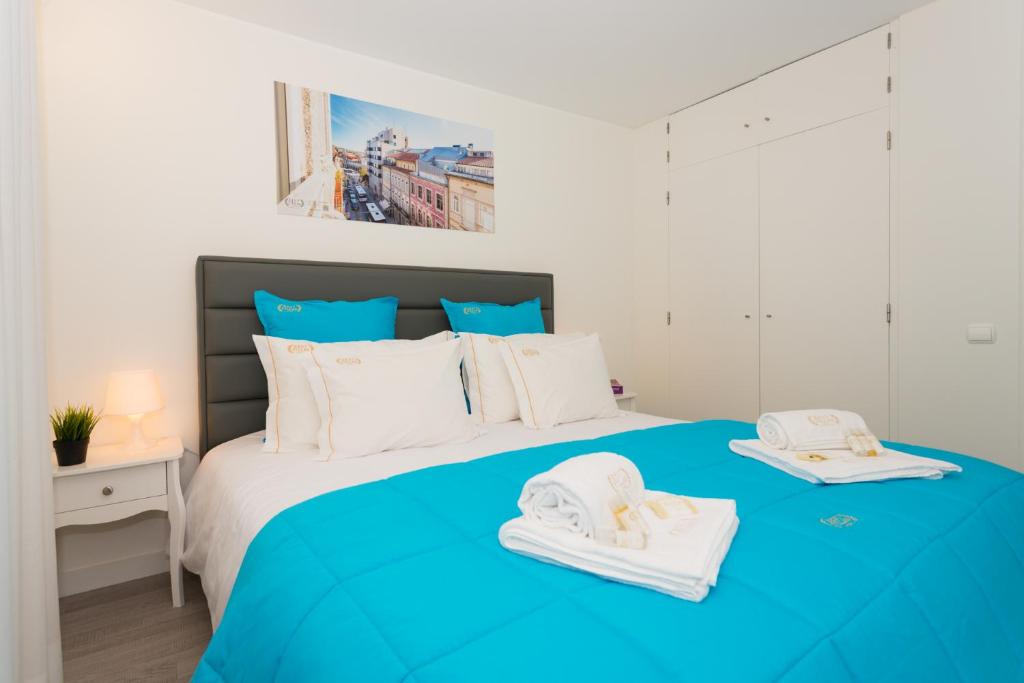 Uma cama ou camas num quarto em BestVillas Foz do Minho
