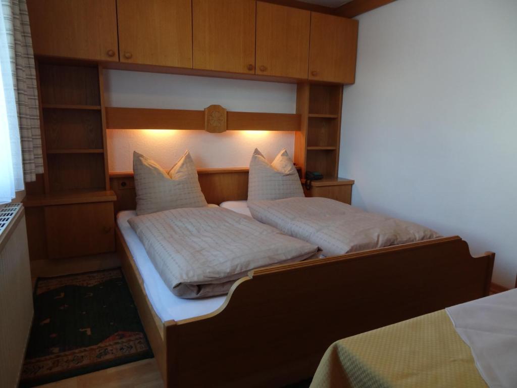 Postel nebo postele na pokoji v ubytování Hotel Peter