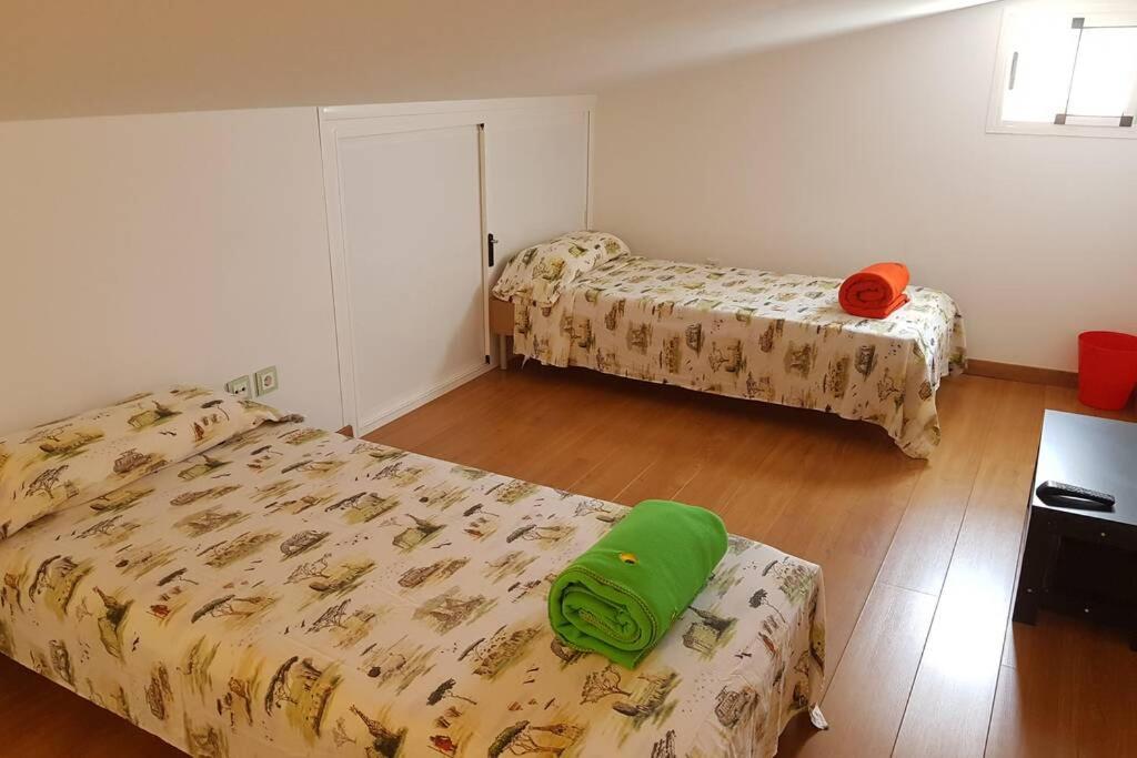 Postel nebo postele na pokoji v ubytování Sonora Aircon Bungalow 121
