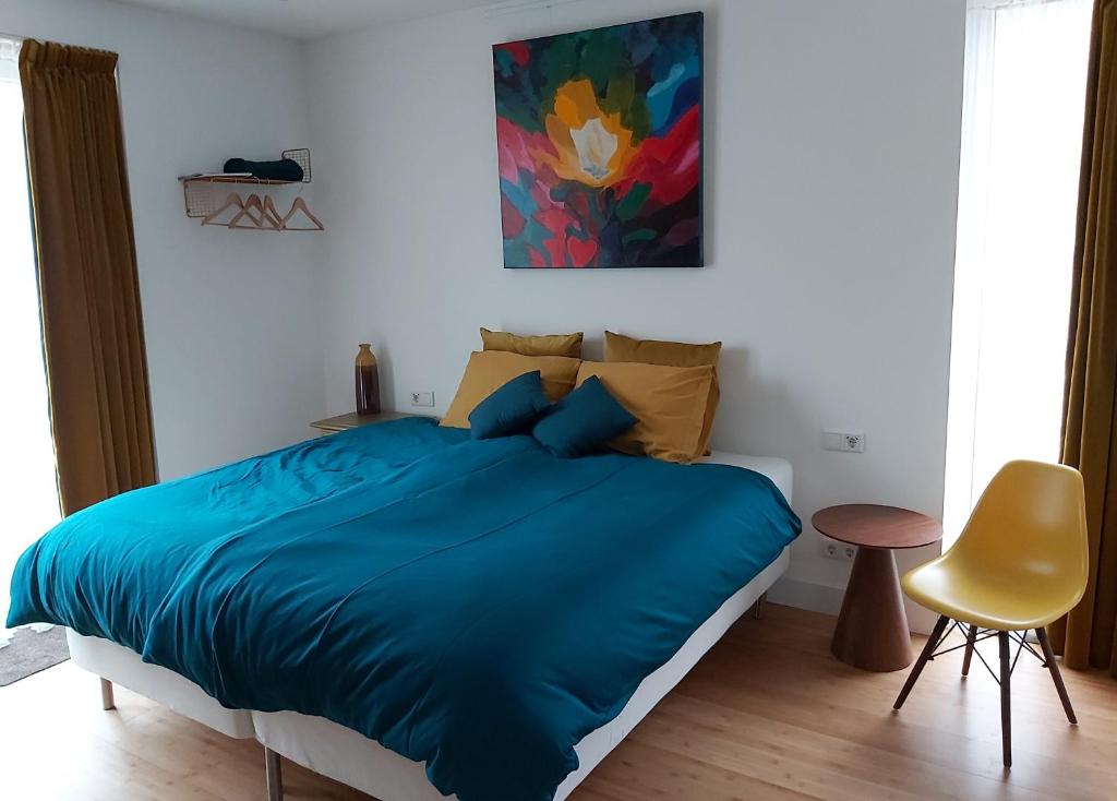 Postel nebo postele na pokoji v ubytování Luxury Suites Oosterwold