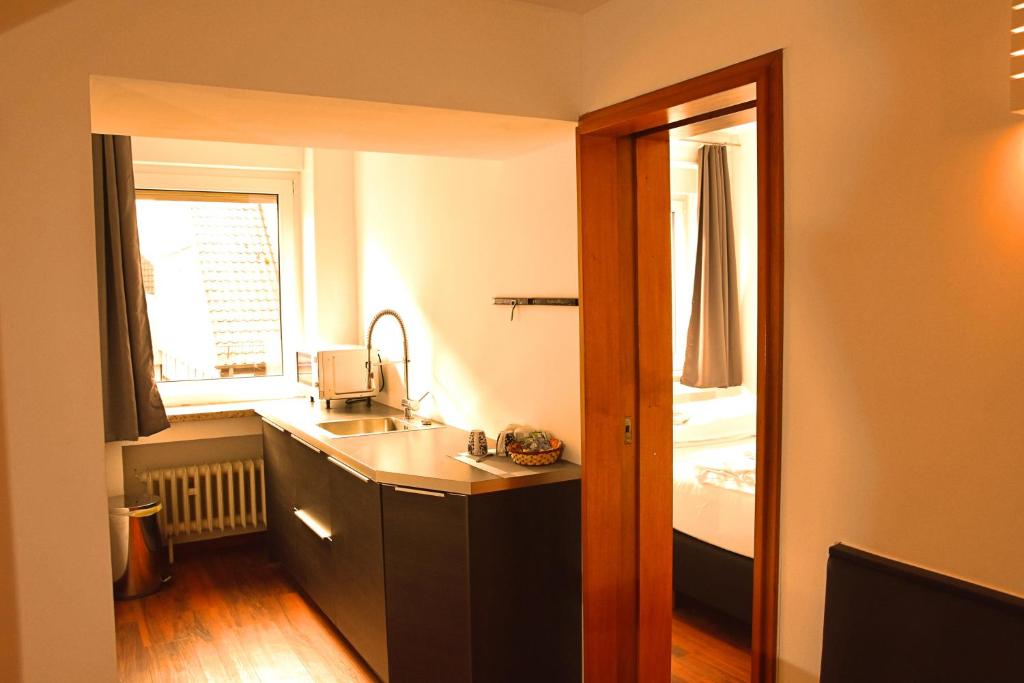 Postel nebo postele na pokoji v ubytování Hotel Walsroder Hof