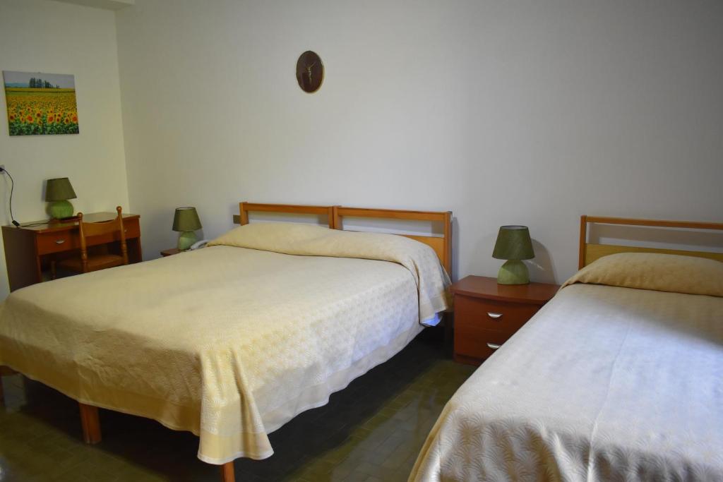 Postel nebo postele na pokoji v ubytování Hotel La Silvana
