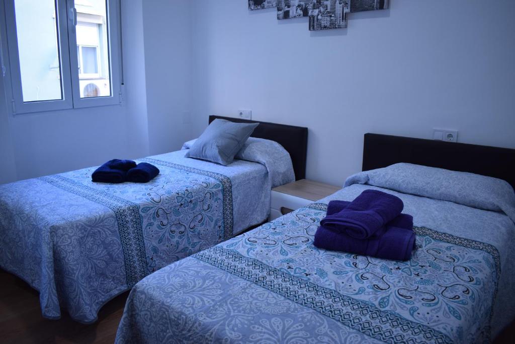 Posteľ alebo postele v izbe v ubytovaní Los Tilos Apartments