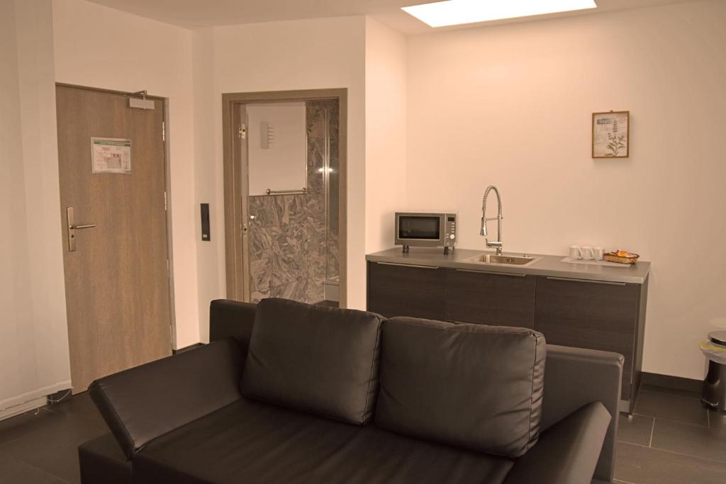 Kuchyň nebo kuchyňský kout v ubytování Hotel Walsroder Hof
