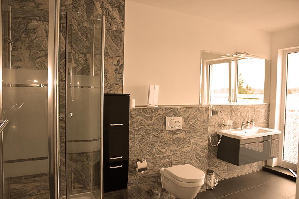 Koupelna v ubytování Hotel Walsroder Hof