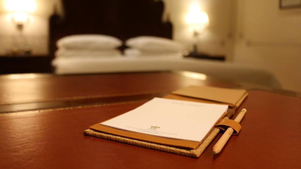 Postel nebo postele na pokoji v ubytování Hotel Solar de las Animas