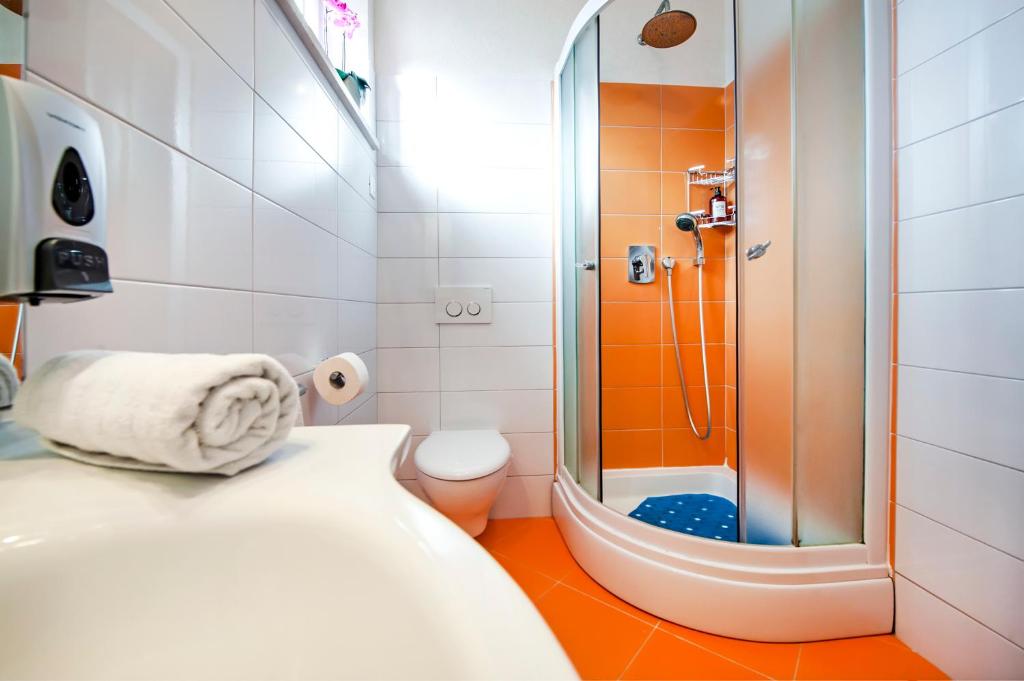 Koupelna v ubytování F&R Apartments