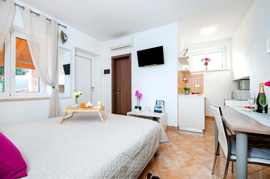 TV a/nebo společenská místnost v ubytování F&R Apartments
