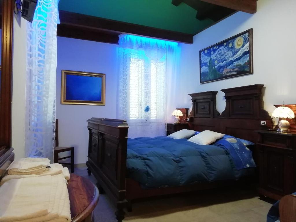 Postel nebo postele na pokoji v ubytování Le mille e una notte