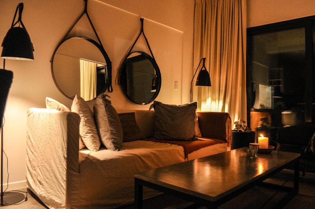 Khu vực ghế ngồi tại Premium Apart frente al Dique Los Molinos