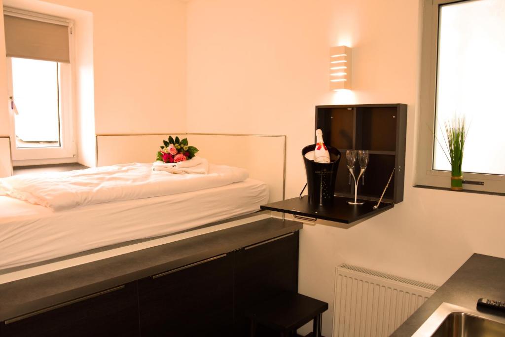 Postel nebo postele na pokoji v ubytování Hotel Walsroder Hof