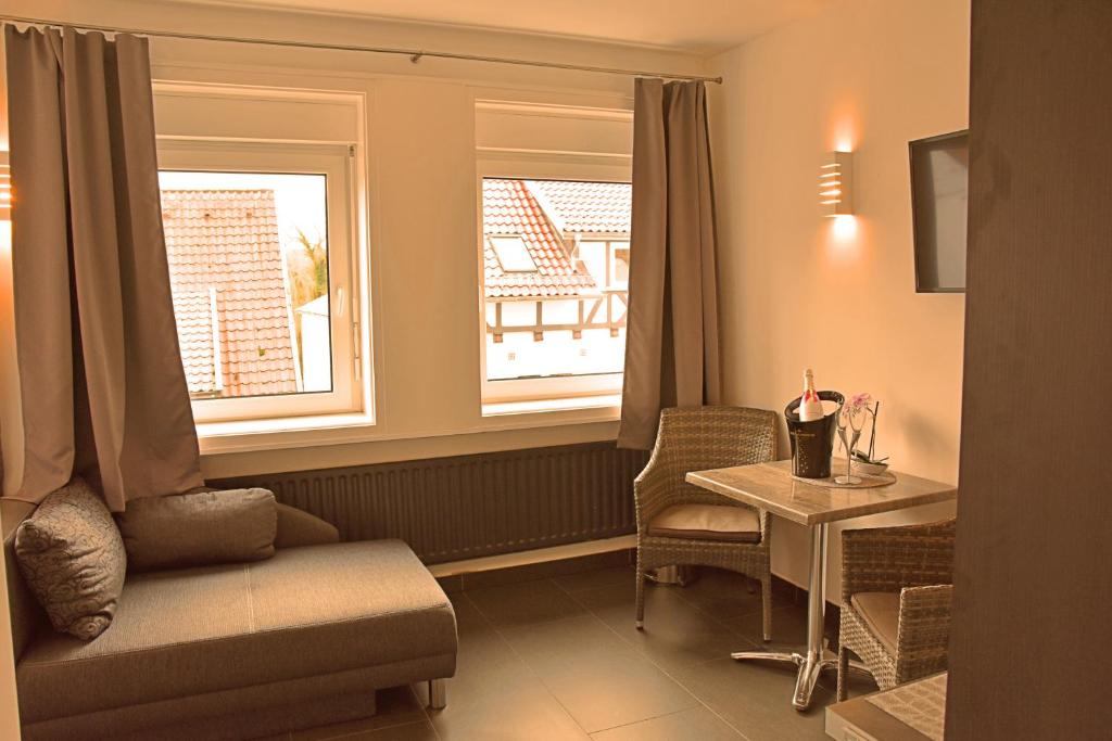 Posezení v ubytování Hotel Walsroder Hof