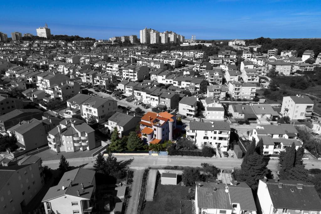 an aerial view of a city with white houses at Vratovic Apartments in Pula