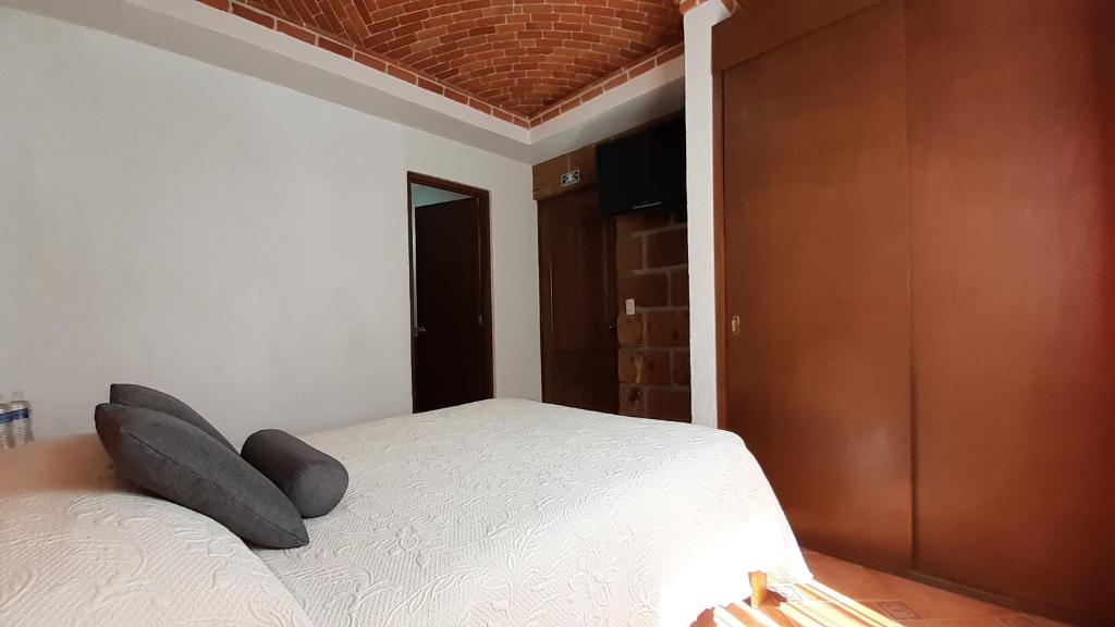 Postel nebo postele na pokoji v ubytování Villas Amalur