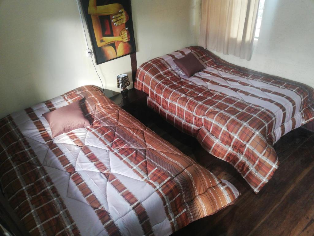 Postel nebo postele na pokoji v ubytování Montano Camping & Hostel