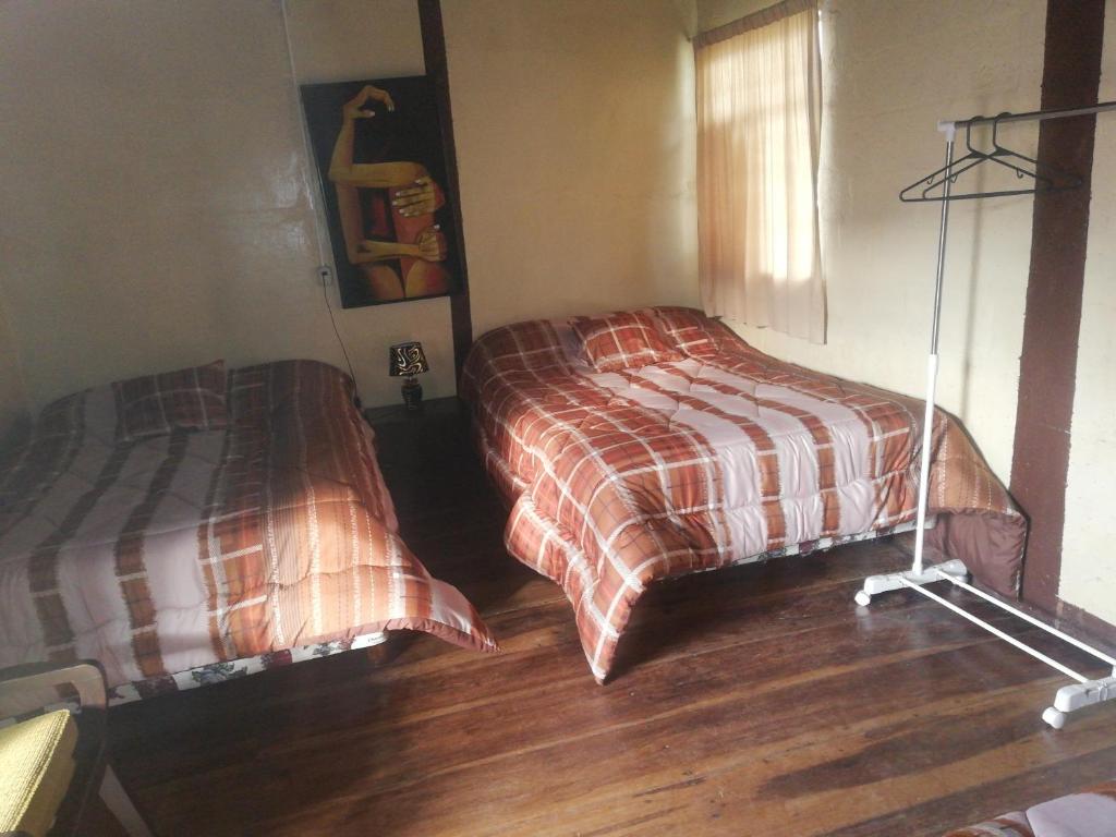 Postel nebo postele na pokoji v ubytování Montano Camping & Hostel
