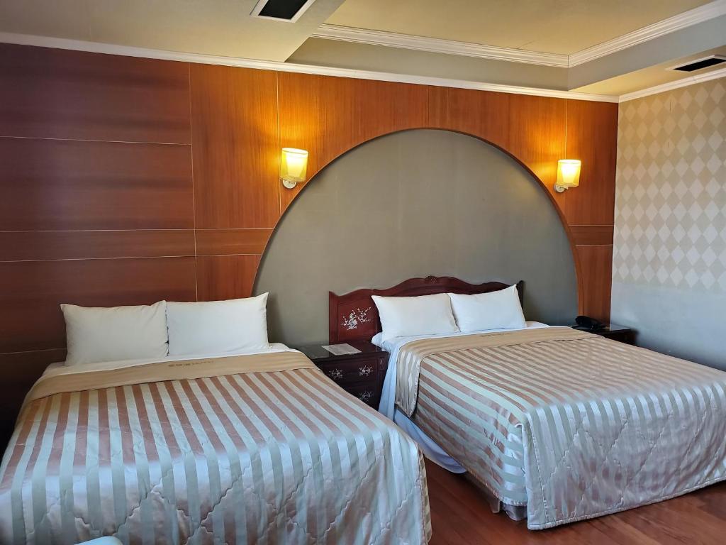 Postel nebo postele na pokoji v ubytování Aegean Garden Motel