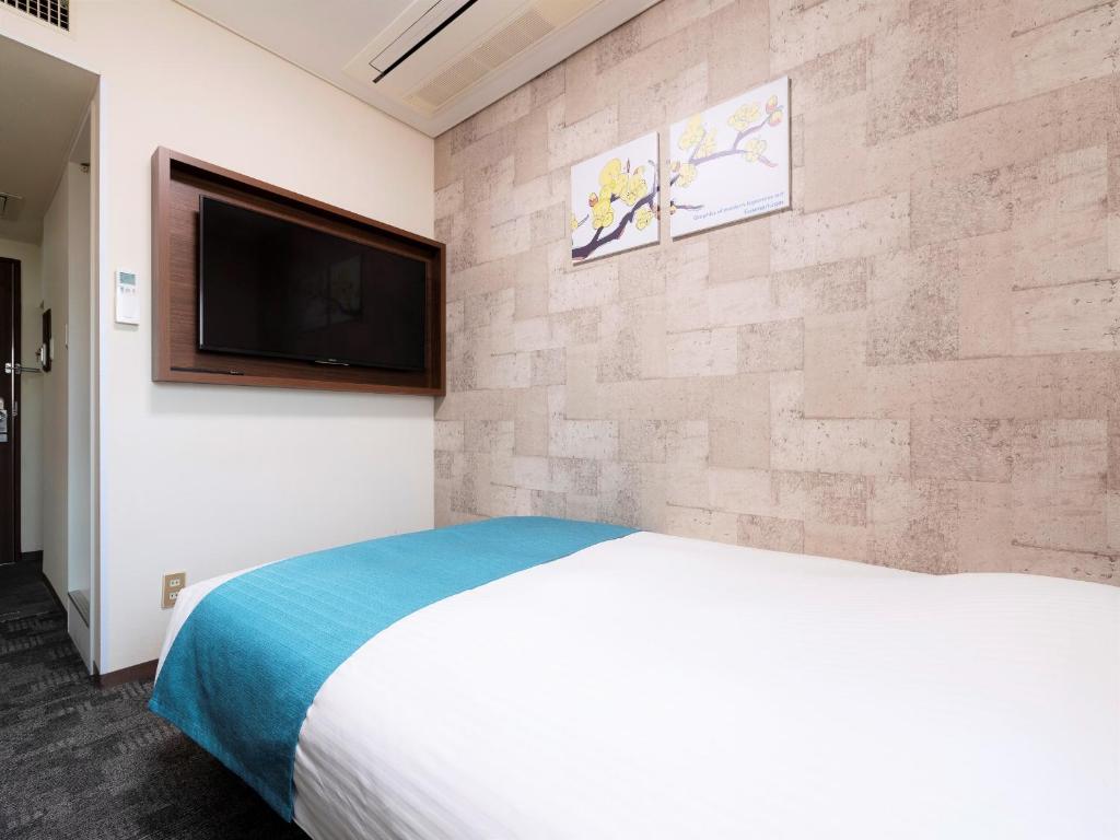 TV a/nebo společenská místnost v ubytování Central Hotel Okayama
