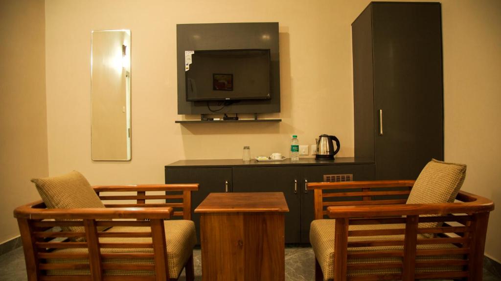 Kuchyň nebo kuchyňský kout v ubytování Nambiars Premium Heritage Hotel
