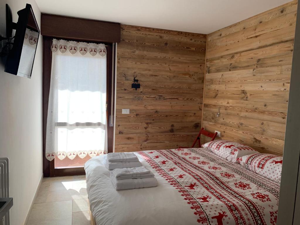 Postel nebo postele na pokoji v ubytování Appartamento 29