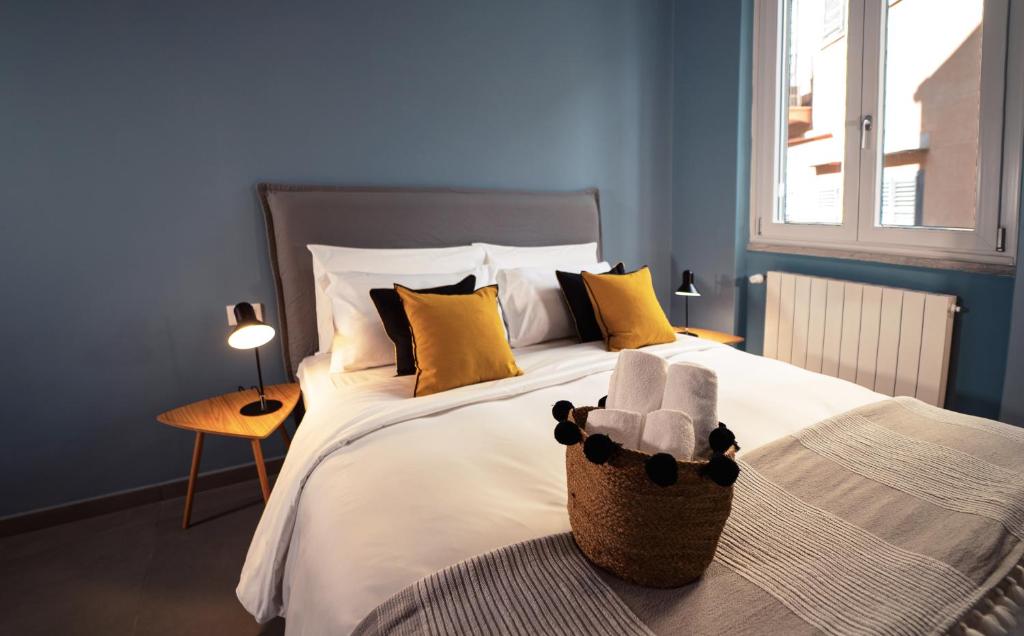 Ένα ή περισσότερα κρεβάτια σε δωμάτιο στο Zefiro Suites