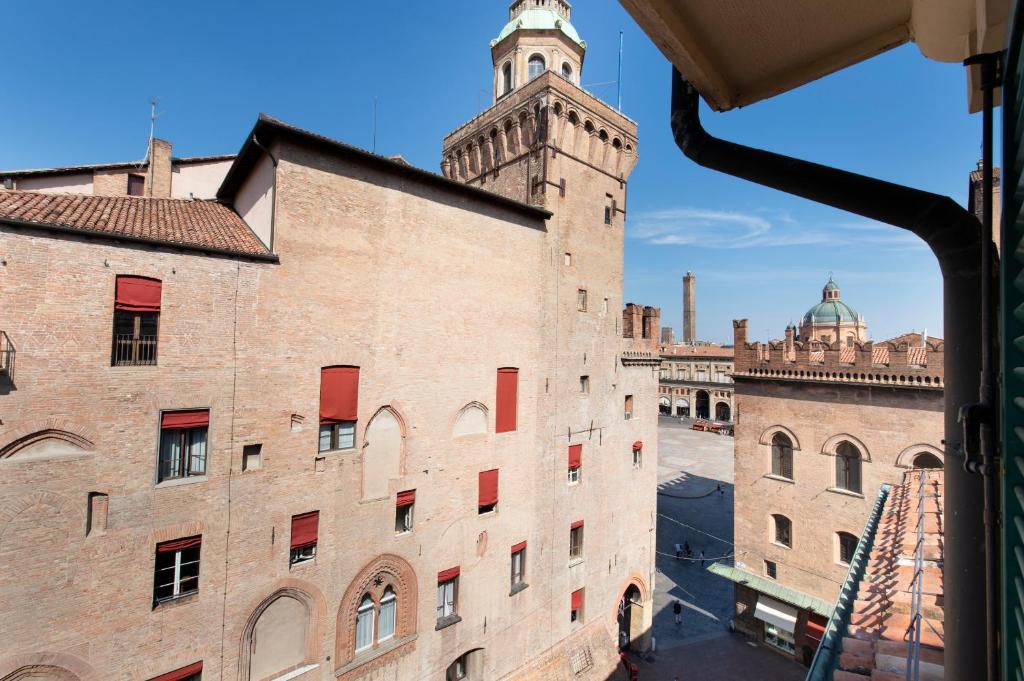 a view of a building with a clock tower at Art Hotel Orologio in Bologna