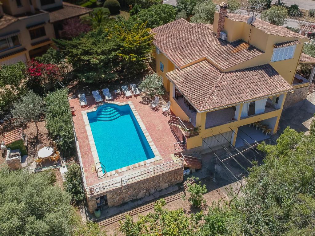 an overhead view of a house with a swimming pool at Casa del Capitán in Santa Ponsa