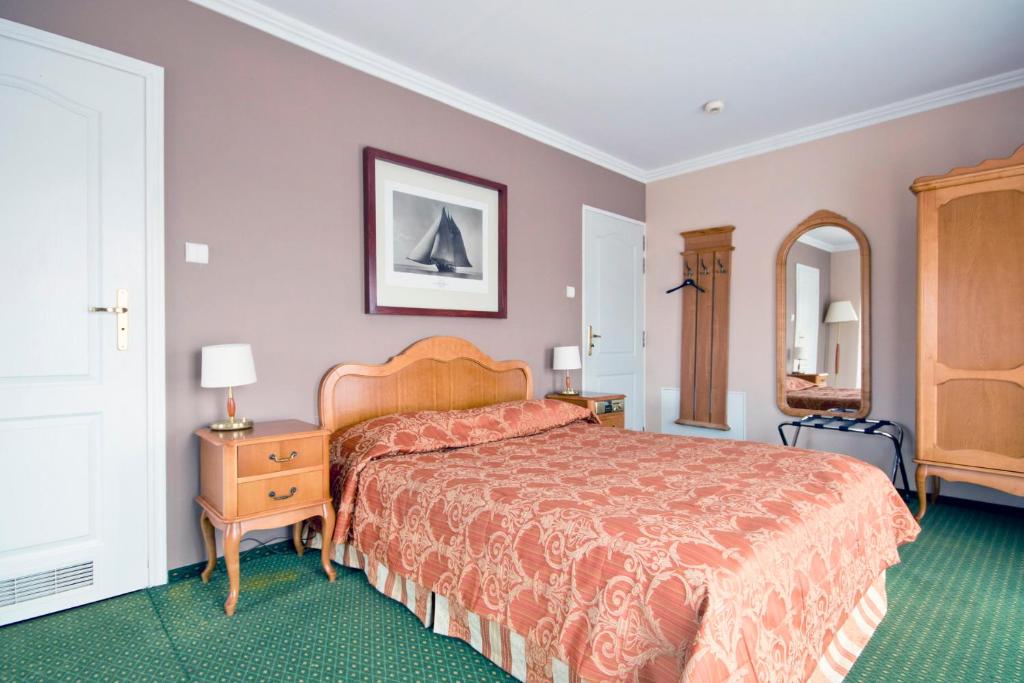 Postel nebo postele na pokoji v ubytování Meduza Hotel & Spa