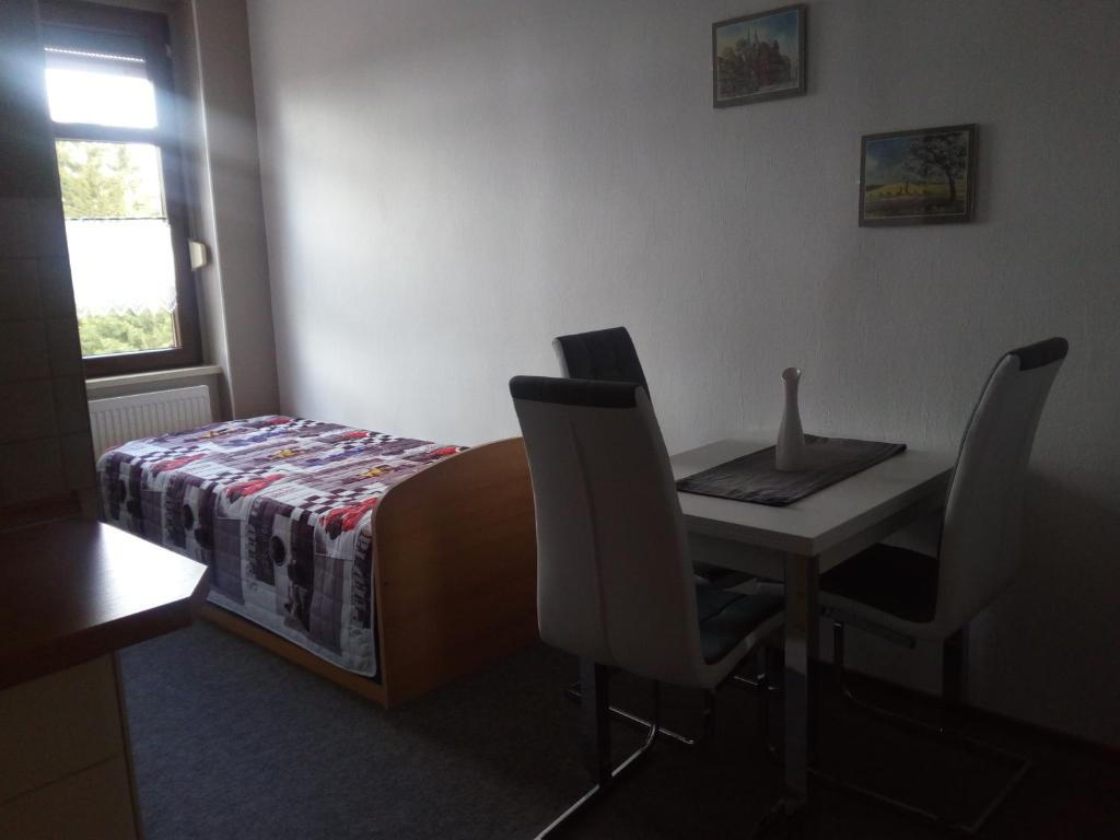 Postel nebo postele na pokoji v ubytování Ferienwohnung Fröhlich