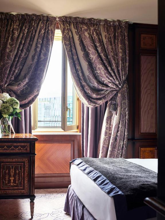 Postel nebo postele na pokoji v ubytování Hotel Principe Di Savoia - Dorchester Collection